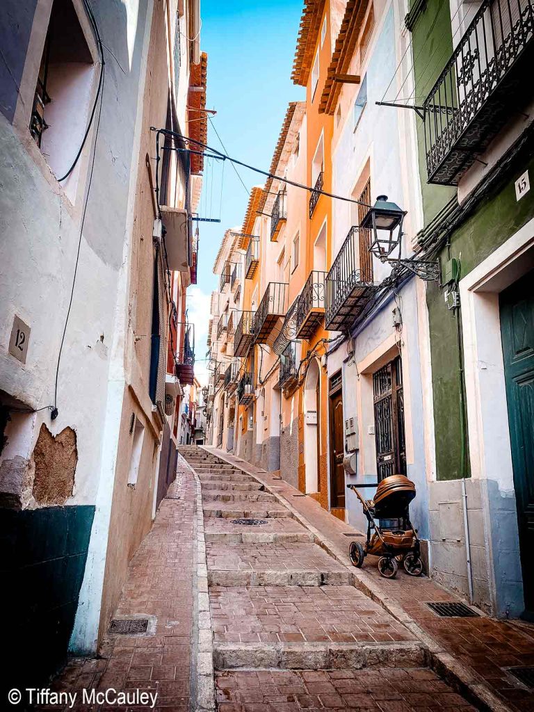 A cobbled street of steps in Villa Joyosa, Spain.